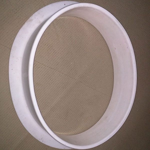 PTFE ELLIPTICAL MANHOLE PROTECTION BUSH.